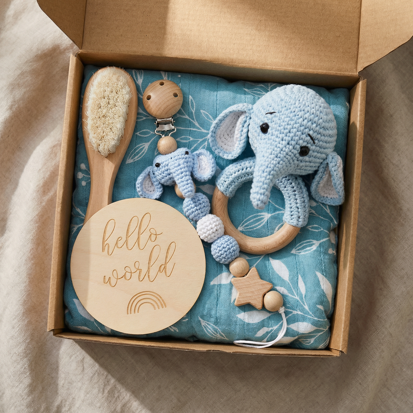 Newborn Gift Box – Crochet Animal Rattle, Wooden Toy, Muslin Blanket & Pacifier Clip